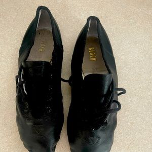 Capezio black lace leather jazz shoes.
